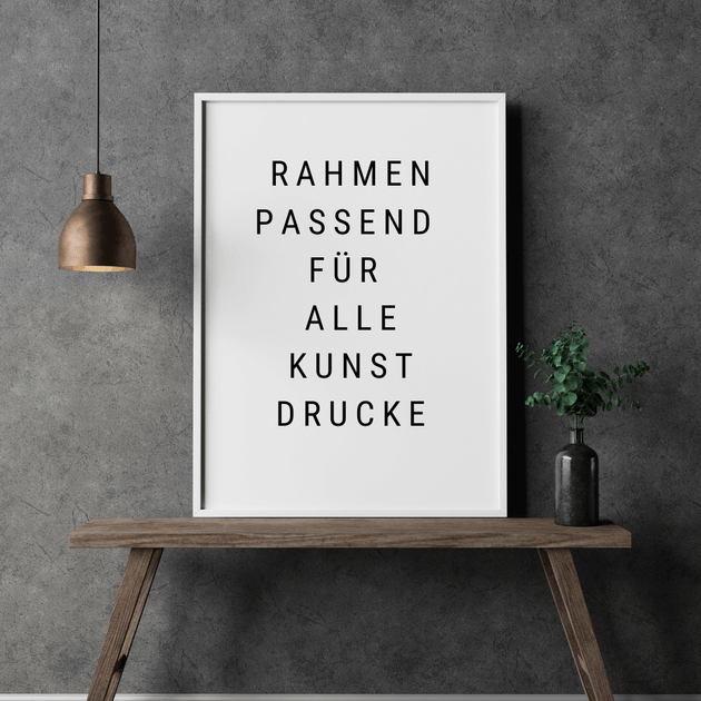 A4 Bilderrahmen weiß mit Text 'Rahmen passend für alle Kunstdrucke' als Wandbild.